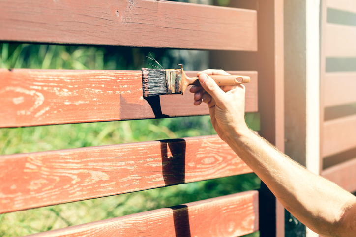 How should I apply the fence stain?